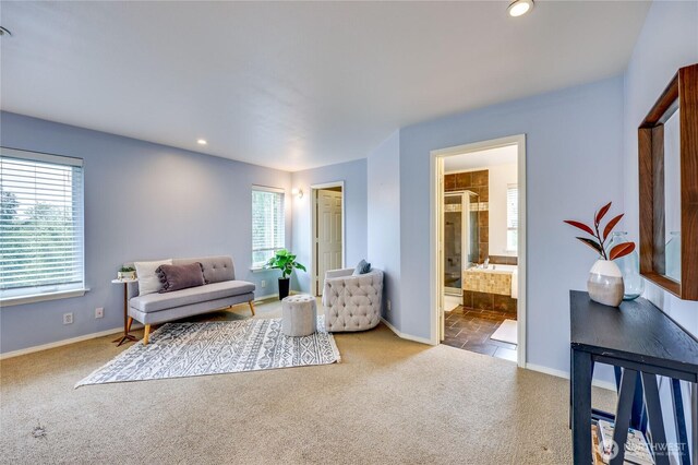 sitting room featuring carpet floors, recessed lighting, and baseboards
