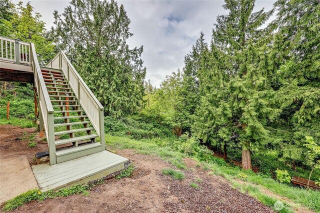 view of yard featuring stairway