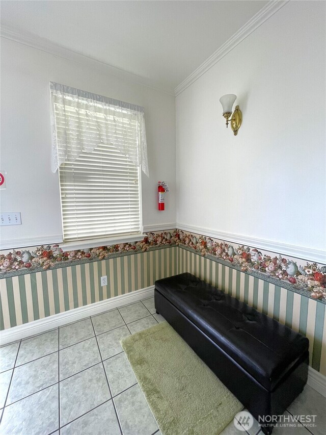 bathroom featuring crown molding, baseboards, wallpapered walls, and tile patterned floors