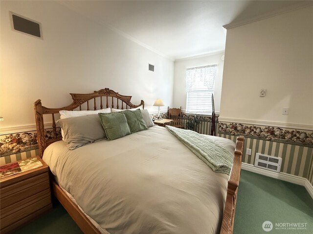 carpeted bedroom featuring crown molding and wallpapered walls