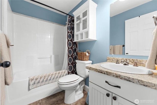 bathroom featuring shower / bath combo, vanity, tile patterned flooring, and toilet