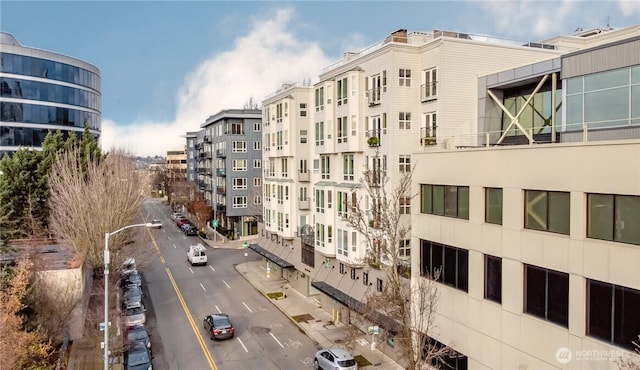 view of property with uncovered parking