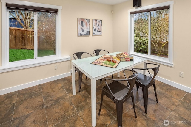 dining room with baseboards