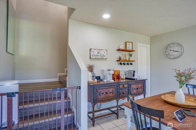 4647 Ohio St, Longview, WA 98632 - interior space with recessed lighting, stairway, tile patterned flooring, and a dry bar