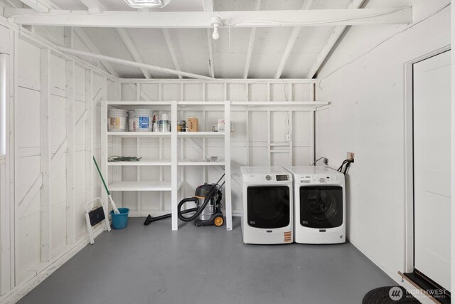 laundry room featuring washer and dryer and laundry area