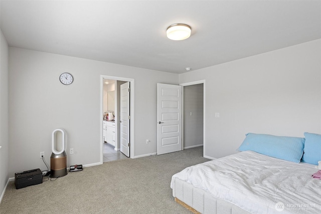 carpeted bedroom with baseboards