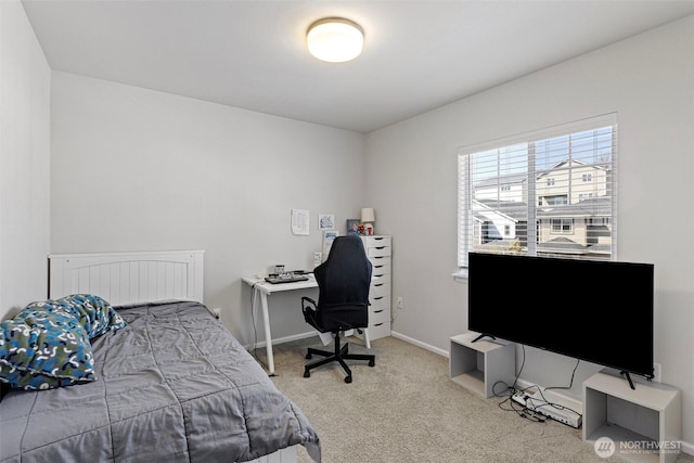 bedroom featuring carpet floors and baseboards