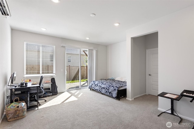 bedroom featuring recessed lighting, carpet flooring, a wall unit AC, and access to outside