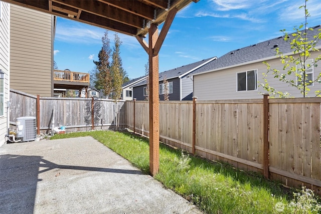 view of patio featuring a fenced backyard and central air condition unit