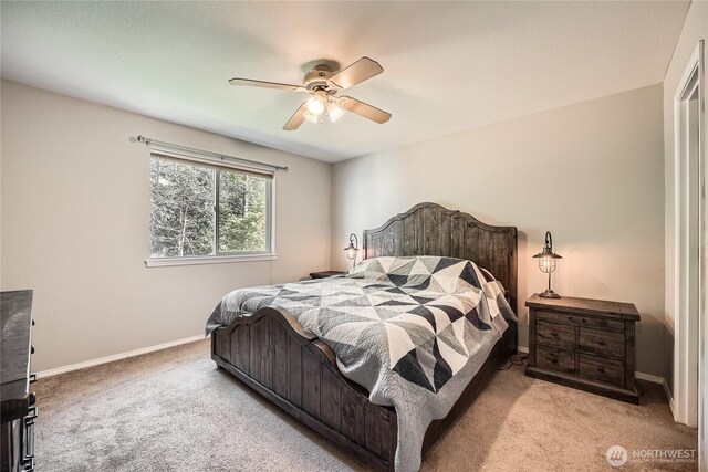 bedroom featuring carpet flooring, baseboards, and ceiling fan