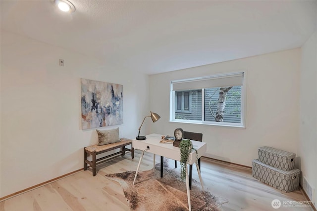1028 Lakeview Blvd E Unit 6, Seattle, WA 98102 - home office featuring baseboards and wood finished floors