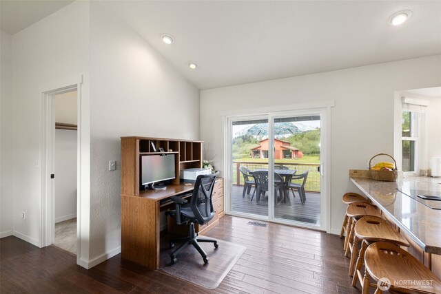 office featuring dark wood finished floors, vaulted ceiling, recessed lighting, and baseboards