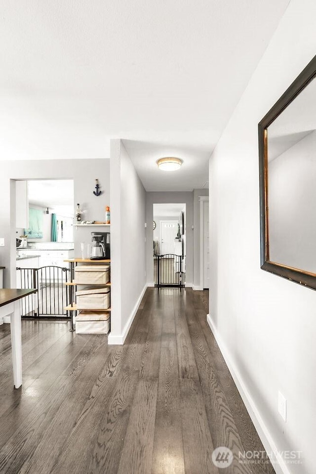 4 Dakota Ln, Elma, WA 98541 - hallway with baseboards and dark wood-type flooring