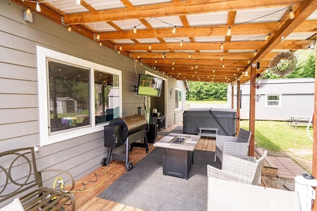 4 Dakota Ln, Elma, WA 98541 - view of patio / terrace with a fire pit, a hot tub, and grilling area