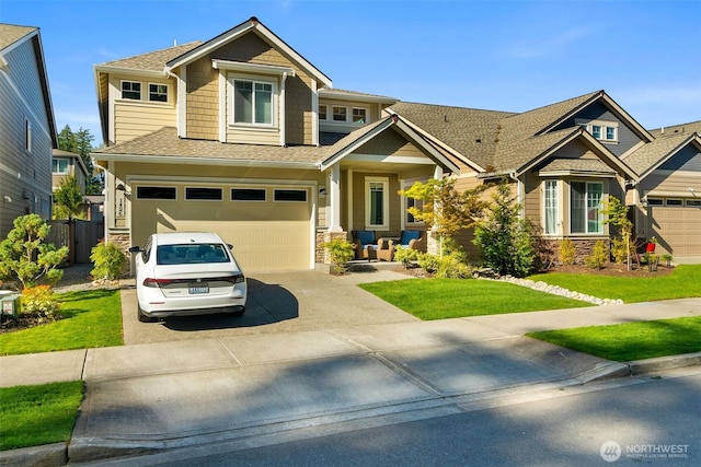 craftsman house with roof with shingles, a front lawn, stone siding, concrete driveway, and a garage