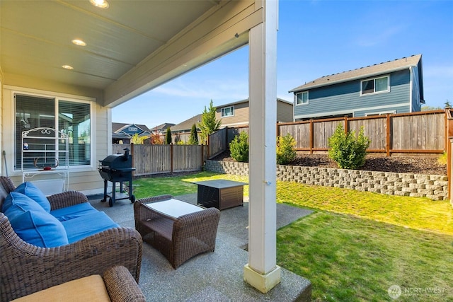 view of patio with a fenced backyard and grilling area