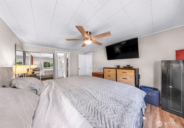 2376 Forest View Dr, Bellingham, WA 98229 - bedroom with light wood-style floors and ceiling fan