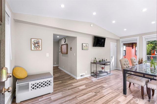 2376 Forest View Dr, Bellingham, WA 98229 - dining space featuring light wood finished floors, vaulted ceiling, and recessed lighting