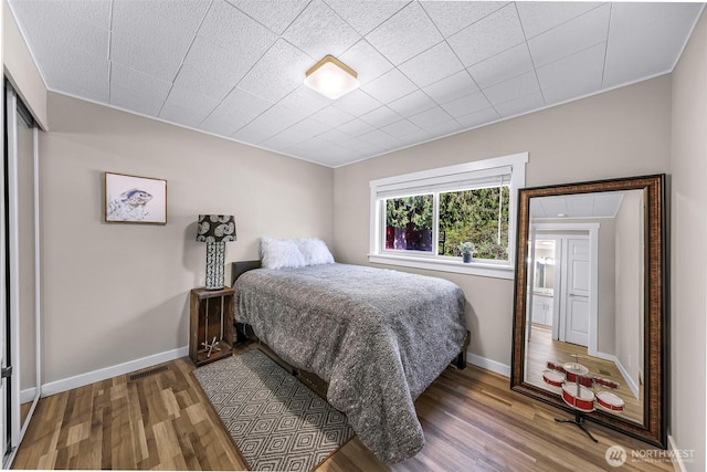 2376 Forest View Dr, Bellingham, WA 98229 - bedroom featuring wood finished floors and ornamental molding