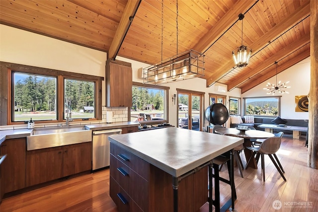 335 Blakely Dr, Blakely Island, WA 98222 - kitchen with stainless steel dishwasher, a sink, a chandelier, wood ceiling with exposed beams, and light wood finished floors