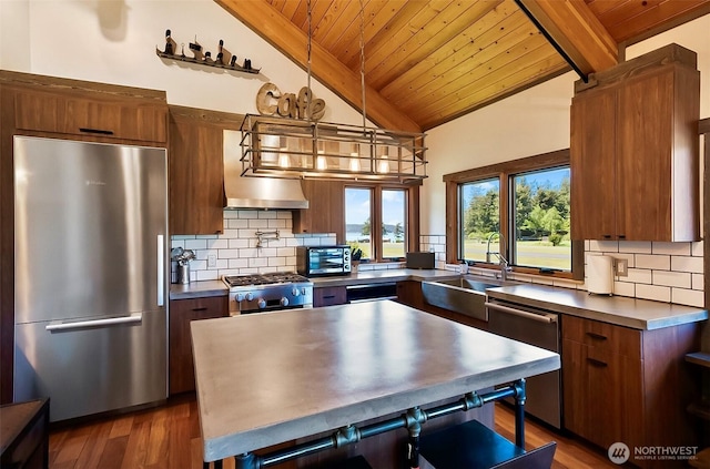 335 Blakely Dr, Blakely Island, WA 98222 - kitchen featuring appliances with stainless steel finishes, wooden ceiling, dark countertops, modern cabinets, and dark wood-type flooring