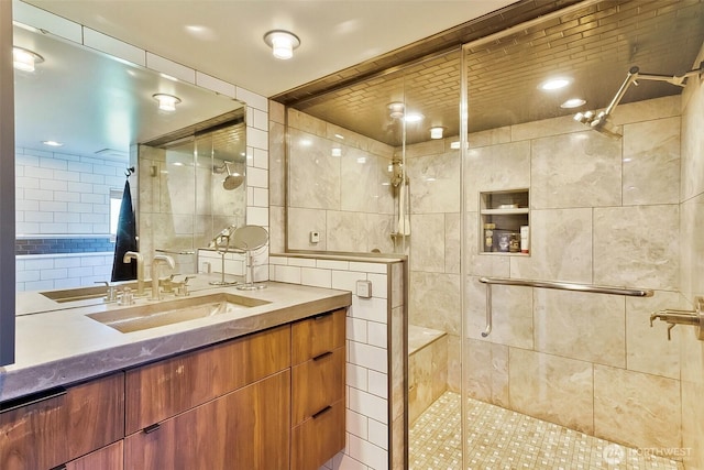 335 Blakely Dr, Blakely Island, WA 98222 - bathroom featuring a stall shower, vanity, and tile walls