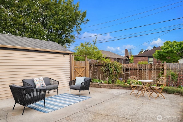 view of patio / terrace with fence and an outdoor hangout area