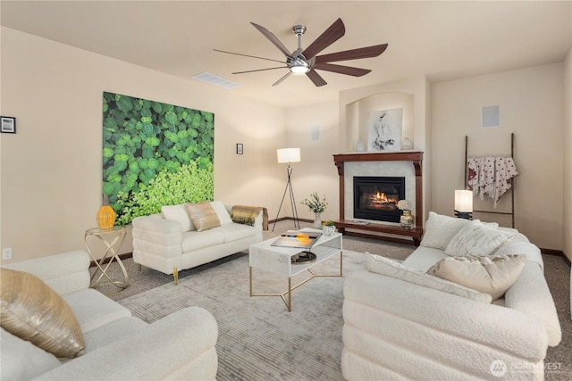 19301 87th Avenue Ct E, Graham, WA 98375 - living room with a glass covered fireplace, visible vents, baseboards, and ceiling fan