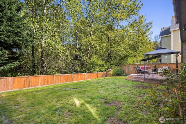 19301 87th Avenue Ct E, Graham, WA 98375 - view of yard with a gazebo, an outdoor hangout area, a fenced backyard, and a deck