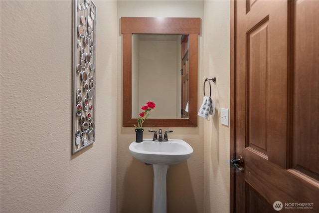 19301 87th Avenue Ct E, Graham, WA 98375 - bathroom with a textured wall