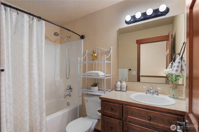 19301 87th Avenue Ct E, Graham, WA 98375 - full bathroom featuring toilet, vanity, and shower / bath combo with shower curtain