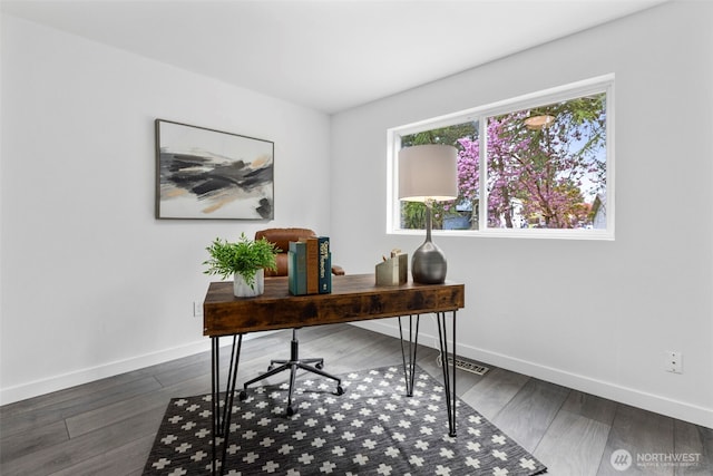home office featuring baseboards and dark wood-style flooring