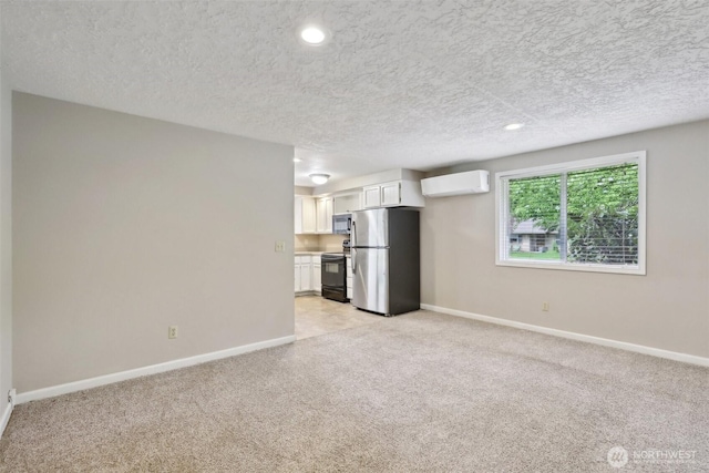 5601 NE Issler St, Vancouver, WA 98661 - unfurnished living room with light carpet, baseboards, an AC wall unit, recessed lighting, and a textured ceiling