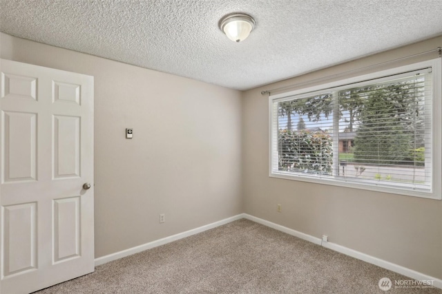 5601 NE Issler St, Vancouver, WA 98661 - carpeted spare room featuring baseboards and a textured ceiling