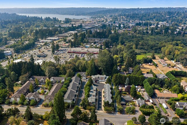 bird's eye view featuring a forest view