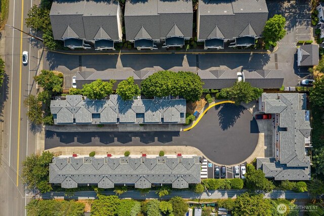 birds eye view of property with a residential view