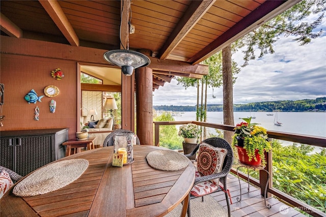 deck featuring a water view