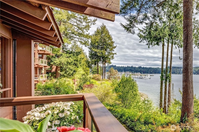 balcony featuring a water view