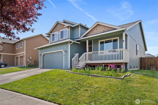 view of front of home with a porch, a front yard, a garage, driveway, and fence