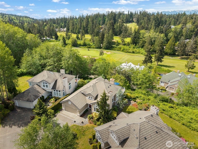aerial view of a golf club and a forest