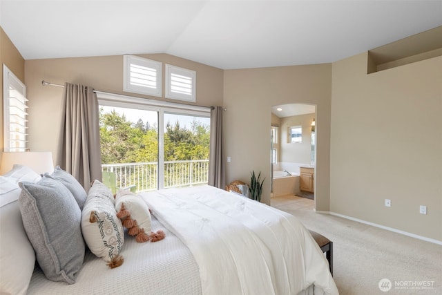 bedroom with lofted ceiling, access to exterior, arched walkways, ensuite bathroom, and light colored carpet
