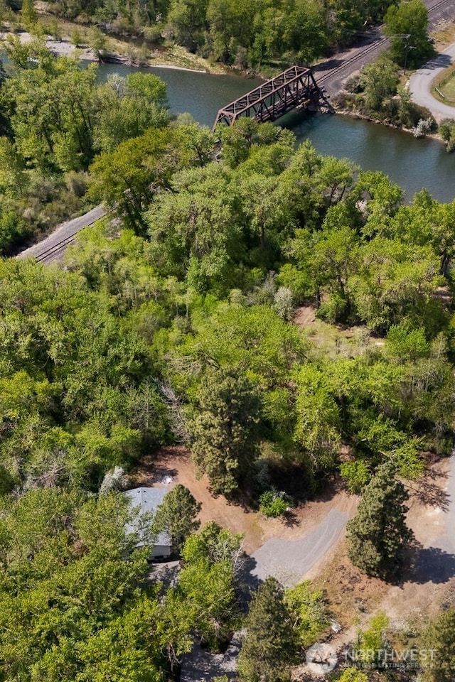 drone / aerial view with a water view