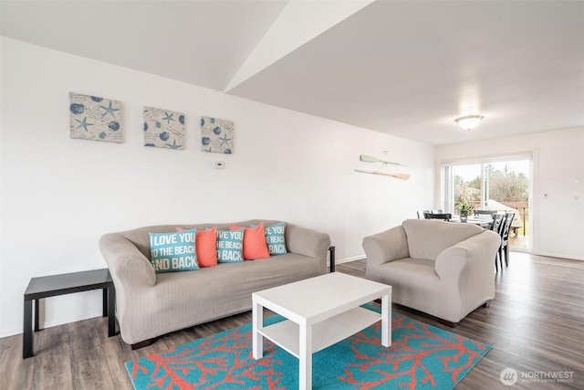 living room featuring wood finished floors and baseboards
