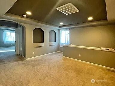 19020 25th Ave E, Tacoma, WA 98445 - unfurnished room with carpet floors, visible vents, baseboards, recessed lighting, and a tray ceiling