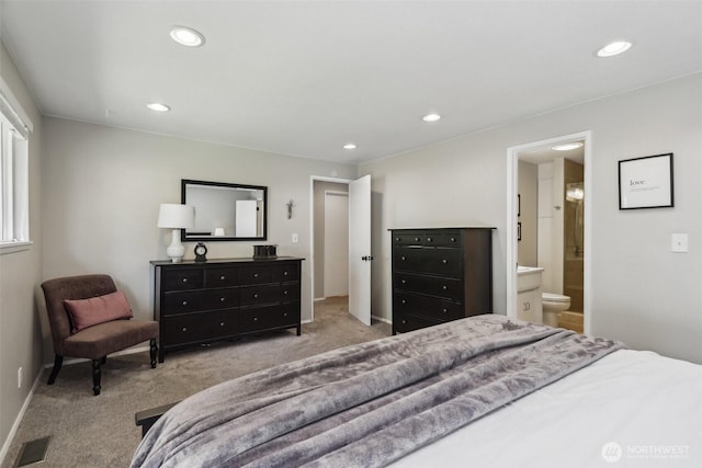 bedroom with recessed lighting, carpet flooring, ensuite bath, visible vents, and baseboards