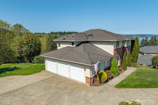 30941 37th Pl SW, Federal Way, WA 98023 - view of side of property with a lawn, driveway, a garage, brick siding, and roof with shingles