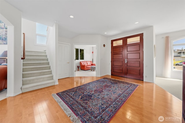 30941 37th Pl SW, Federal Way, WA 98023 - entryway featuring stairs, a healthy amount of sunlight, and wood finished floors
