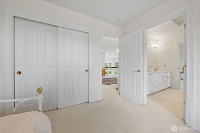 30941 37th Pl SW, Federal Way, WA 98023 - bedroom featuring a closet, light colored carpet, and a sink