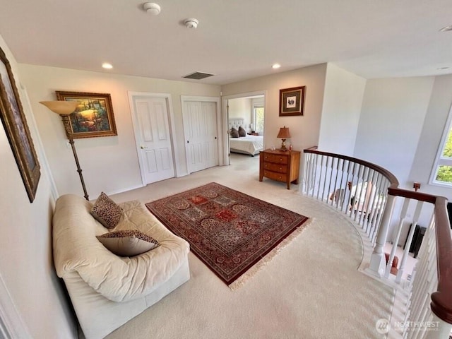 30941 37th Pl SW, Federal Way, WA 98023 - living area featuring visible vents, an upstairs landing, light colored carpet, and recessed lighting