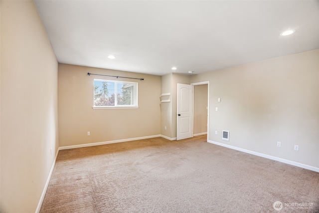 unfurnished room with baseboards, recessed lighting, and carpet
